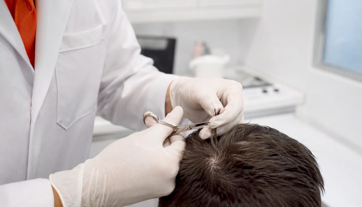 Hair sample collection from scalp close-up