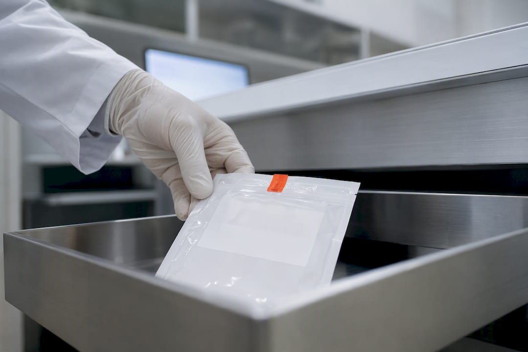 Technician handling workplace drug test specimen