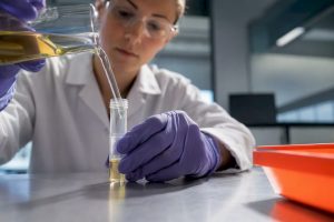 Toxicology technician preparing sample analysis